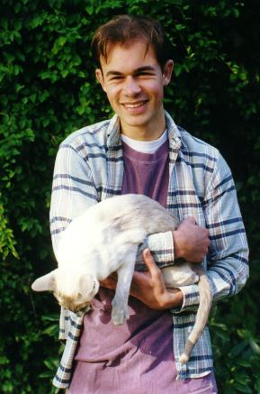 [Picture of Kitti trying to escape from Jon]